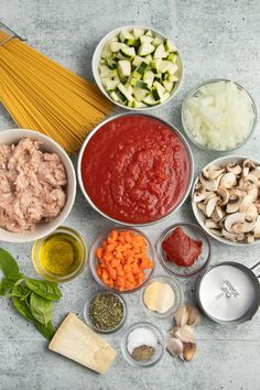 the ingredients are laid out in bowls on the table to be used as an appetizer