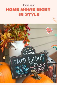 halloween movie night in style with chalkboard sign and pumpkins