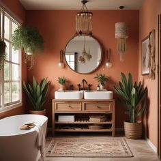 a bathroom with two sinks, a tub and a round mirror on the wall above it