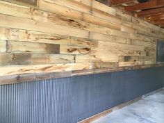 a wall made out of wooden planks in a building