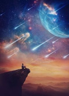 a man sitting on top of a cliff looking at the stars and planets in the sky