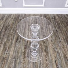 The 13.75 X 13.75 X 21" clear acrylic side table is gorgeous. Top is 0.43" thick, 13.75" in diameter. Bottom is 10" in diameter. Post diameter 4" at the widest point, and 1.6" at the narrowest point. Sturdy end table cast with great craftsmanship. Weights 13 lbs. Sturdy and holds 80 lbs+ of static weight. Versatile use. This is a great table that serves as a reading table, drink table, floral centerpiece, riser for plants, sculpture, lights, and nightstand. Prepare to be "wowed". Timeless beauty Sculpture Lights, Nightstand Round, Acrylic End Table, Acrylic Side Table, Side Table Modern, Tall End Tables, Reading Table, Nursery Room Inspiration, Floral Centerpiece