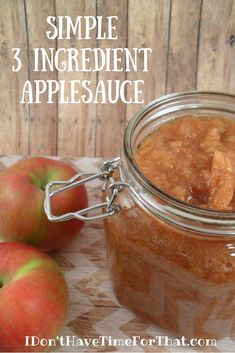 an apple sauce in a glass jar with apples around it and the words, simple 3 ingredient apple sauce