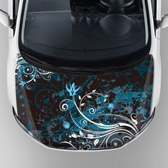 an image of a car with blue flowers on it