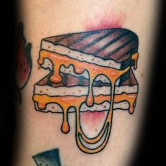 a tattoo with a sandwich on it