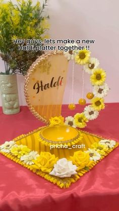 a table topped with yellow and white flowers