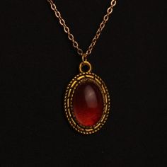 Ask Me About My Custom Pieces. I Can Make Any Color Or Style. Handmade By Jewel Vintage Oval Pendant Epoxy Oval Dark Red Pendant Transparent 20 Inch Gold Chain Red Wedding Headpiece, Luxury Oval Pendant For Jewelry Making, Gold Red Necklace, Red Oval Pendant Vintage Necklace, Vintage Red Oval Pendant Necklace, Red Vintage Oval Pendant Necklace, Medieval Jewelry Aesthetic, Gold Vintage Necklace, Red Stone Jewellery