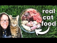 a woman is holding her cat in front of a bowl of food on the grass