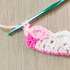 a crochet heart is being worked on