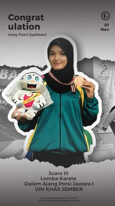 the woman is holding a stuffed animal in her hand and wearing a green jacket with yellow stripes