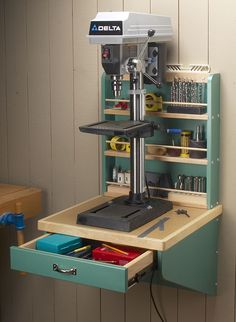 a workbench with tools in the drawer