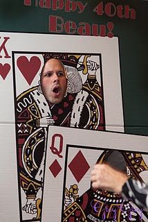 a man is making a face while playing cards