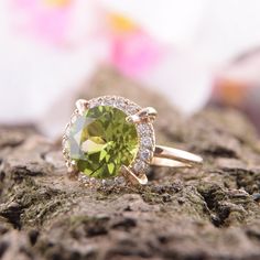 "Peridot ring, Yellow gold ring, Art deco ring, Anniversary ring, Antique ring, Victorian ring, Geometric ring, Gold ring for her WE OFFER UNLIMITED PERIOD INSTALLMENTS PLAN This is a beautiful, stunning, feminine ring that works well for all occasions, styles, and ages. You will love it! Ring information: Main stone: Peridot Approximate size: 9mm Accent stone: Cubic zirconia Metal type: Gold Metal stamp: 14k Gold Customization / Replacements It's easy to create jewelry that's perfect for you. C Gold Crystal Open Ring With Halo, Gold Crystal Halo Ring With Open Design, Gold Crystal Halo Open Ring, Gold Halo Crystal Open Ring, Gold Art Deco Ring With Halo Setting, Art Deco Gold Rings With Halo Setting, Gold Art Deco Rings With Halo Setting, Gold Sapphire Ring With Halo Design, Green 14k Gold Ring For Proposal