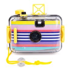 a small camera with yellow straps and a strap around it's neck, on a white background