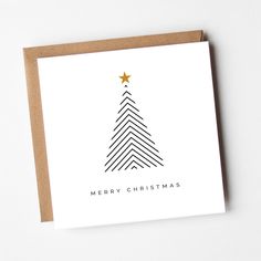 a card with a christmas tree on it