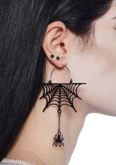 Look spooky in these drop earrings that have web and dangling spider charms. Edgy Dangle Earrings For Halloween, Black Dangle Halloween Jewelry, Edgy Pierced Halloween Earrings, Edgy Pierced Earrings For Halloween, Edgy Drop Earrings For Halloween, Edgy Halloween Pierced Earrings, Edgy Halloween Drop Earrings, Spooky Black Drop Earrings, Spooky Black Earrings For Party