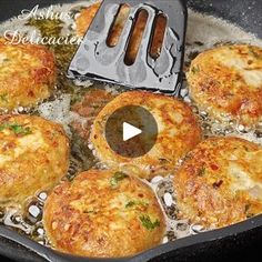 some food is cooking in a skillet on the stove and it looks like they have been cooked