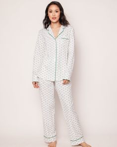 Game, set, sleep! Serve up a winning combination of comfort and style with our tennis print pajamas. Featuring a pair of classic crossed green racquets and a tennis ball, this design captures the undeniable charm of a classic sport. Whether you're a tennis enthusiast or simply appreciate it from the stands, these hand-drawn motifs celebrate the spirit of the game. This classic pajama set is accented with green piping and finished with pearl buttons. The fabric is made from 100% of the finest qua Baby Gear Essentials, Classic Pajamas, Match Point, Racquets, Perfume Gift Sets, Print Pajamas, Shoe Size Conversion, Tennis Ball, Fragrance Design