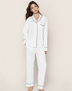 The quintessential, timeless pajama silhouette that always feels fresh: supple elastic waist, single piping detail at collar, breast pocket, and pajama pant cuff and practical pockets. As effortless and comfortable as luxury sleepwear gets. For thousands of years, Pima cotton has been considered royalty in the realm of textiles. This design features 100% yarn-dyed Peruvian Pima, meaning your cherished pieces will stay buttery and breathable, with a reduced risk of fading, pilling, or wrinkling. Luxury Sleepwear, White Pajamas, Classic Pajamas, Pajama Pant, Cuffed Pants, Shoe Size Conversion, Home Wear, Shoe Size Chart, Perfect Day