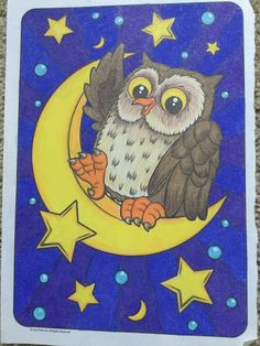 an owl is sitting on the moon with stars around its neck and eyes, which are drawn in colored pencils