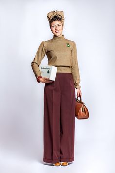 Beige coloured wide, high waisted pleat- front trouser with side button fancing on the left side and creases.The trouser has 4 cm turn ups. The fabric is a polyester/ wool mix.55% polyester 45% woolmachinewashing wool program 30s Outfits, 1930s Outfits, Beach Pajamas, Green Jumper, Lindy Hop, 1940s Style, Vintage Inspired Fashion