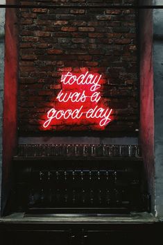 a neon sign that says today is a good day