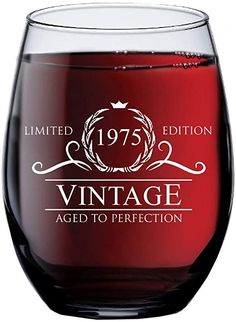 a wine glass with the words vintage aged to perfection on it