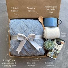 the contents of a gift box for someone's new baby