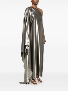 The Taller Marmo Metallic Maxi Dress is a gold-tone silk dress with a concealed side zip fastening and metallic threading. The dress has an asymmetric neck and dart detailing. It features a one-shoulder, single armhole and a belted waist. The dress has a partial lining and a straight hem. The dress is long length. Taller Marmo, Grey Maxi Dress, Gold Dress, Threading, Long Length, Dart, Silk Dress, Side Zip, The Dress