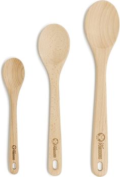 three wooden utensils with different shapes and sizes, one is white and the other is light wood