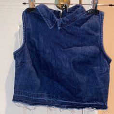 Never Worn Denim Collared Crop Top With Zipper In The Back And Fringe Bottom! Great Condition Washed And Smoke-Free Home! Size: Xs/4 Casual Cropped Denim Blue Vest, Trendy Cropped Dark Wash Denim Top, Casual Cropped Medium Wash Top, Trendy Dark Wash Sleeveless Top, Trendy Sleeveless Dark Wash Top, Dark Wash Cropped Cotton Tops, Spring Denim Blue Cutoff Top, Casual Cropped Medium Wash Denim Top, Spring Cutoff Denim Blue Top