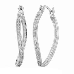 Lovely, elegant .25 ct. t.w. diamond hoop earrings in .925 Sterling silver with rhodium plating. The sparkling 40 natural diamonds are set in a prong setting. The width of the earring is 0.10" while the height is 1". Gift box is included with purchase of these earrings.  Product Features:  * Sterling silver with Rhodium * Total diamond carat weight: .25 ct. t.w. * Sterling silver * Gift box is included *  Product information is provided by the supplier and BJ’s does not represent or warrant the information is accurate or complete. Always consult the product’s labels, warnings, and instructions before use. Please see additional terms atbjs.com/termsofuse Diamond Earrings For Women, Twisted Hoop Earrings, Diamond Carat, Fine Jewellery Earrings, Jewelry Earrings Hoops, Silver Diamonds