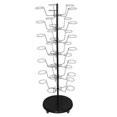 a metal rack with several cups on it and wheels attached to the top of it