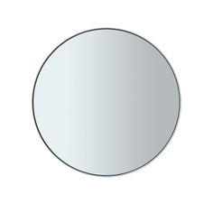 a round mirror on the wall with no reflection in it's center and bottom edge