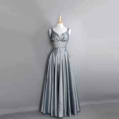 A stunning evening gown or ball gown made from a beautiful shot taffeta in silver/grey. The bodice features our ultra flattering wide fitted waistband and romantic sweetheart neckline and the dress has a generous full length, full circle skirt. The dress is shown in a sleeveless style but it can also be made with cap, elbow or 3/4 length sleeves - please message us for more info.  In the last two photos the dress is shown with our beautiful sequin lace bolero which is not included in the sale bu Dig For Victory, Lace Bolero, Full Circle Skirt, Full Circle Skirts, Long Torso, Full Circle, Vintage Glamour, Circle Skirt, Dress Clothes For Women