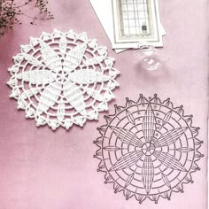 two crocheted doily patterns on a pink background, one with a white lace doily