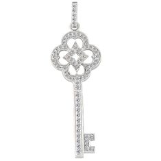 Unlock your affair with the key to her heart. Round brilliant diamonds totaling 0.43ct pave set in 14K white gold compose this Vintage key pendant. Pendant comes in a free 18" white gold cable chain. Details :Height- 10mmLength- 16mmWidth - 3mmPolished FinishDiamond Details:Cut - Very GoodColor - FGClarity - SI2 (Slight Inclusions)Total Carat Weight - 0.43ct Pendants Diamond, Celtic Pendant, Key Pendant Necklace, Vintage Key, Diamond Pendants, Gemstone Pendants, Vintage Keys, Buying Diamonds, Jewelry Design Necklace