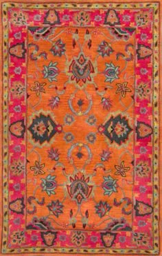 an orange and pink rug with floral designs