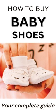 woman holding a pair of baby shoes Baby Shoes, Take A, Look At, Parenting