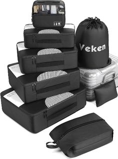 several pieces of luggage are stacked on top of each other with the words veken written on them