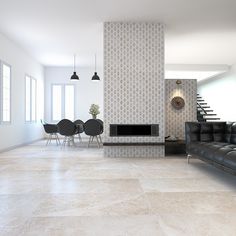 a modern living room with black leather couches and white tile flooring is pictured in this image