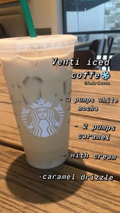 an iced coffee drink on a wooden table with information about the drinks and ingredients in it