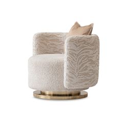 a white chair with a beige pillow on top of it and a gold metal base