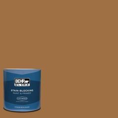 a brown paint can with the words behrr ultra stain - blocking on it