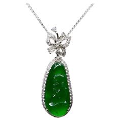 Please check out the HD video. Here is a natural imperial Jadeite Jade monkey and diamond pendant with the best imperial green color. This color is rare because it exhibits a strong saturation of green combine with high translucency. It is certified by 2 different labs. The jade monkey motif represents protector and strength. The pendant is set in 18k white gold and diamonds. A beautiful diamond butterfly on top of the imperial jade monkey is a nice accent. We conservatively estimate 0.50cts of Jade Jewellery, Imperial Jade, Diamond Drop Pendant, Diamond Butterfly, Gold Medallion, Drop Pendant Necklace, White Gold Chains, Jade Jewelry, Natural Jade