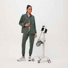 Official FIGS® Outerwear. Get Free Shipping On Orders $50+! | FIGS Womens Bonsai Page - Scrub Jacket Black Fig, Mens Scrubs, Scrub Jackets, Womens Scrubs, Women's Jackets, Fleece Vest, Scrub Pants, Scrub Tops, Anti Wrinkle