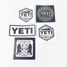 the yeti stickers are designed to look like they have different logos on them