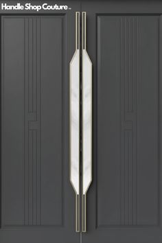 the handle shop couture front door is shown in black and features an art deco design