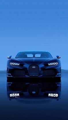 a bugatti car is shown in the dark water