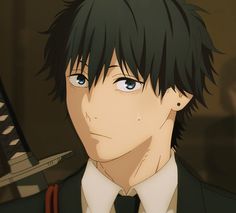 an anime character with black hair and blue eyes